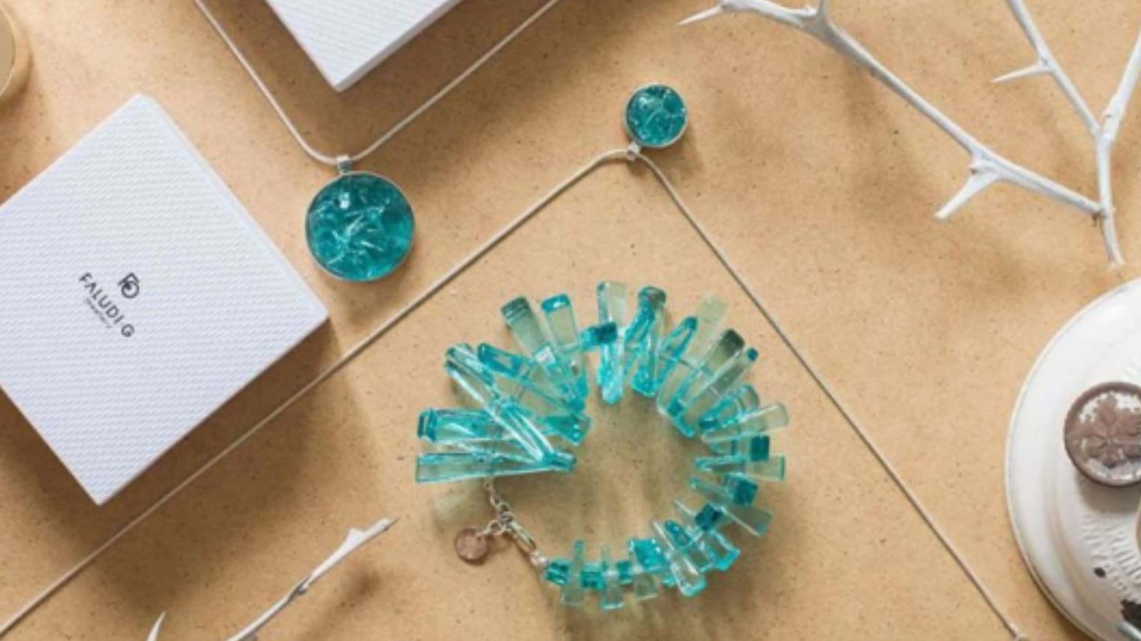 Faludi G specialty glass jewels are used for Jimmy Choo photo shoot in Budapest shopping tour.